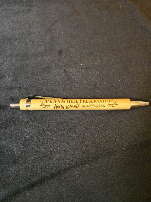 Bamboo pen engraved with Bones & Hide Preservation