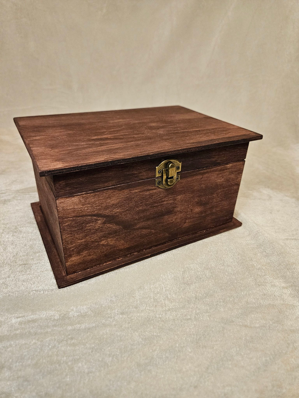 Large handcrafted wooden keepsake box with brass latch, closed