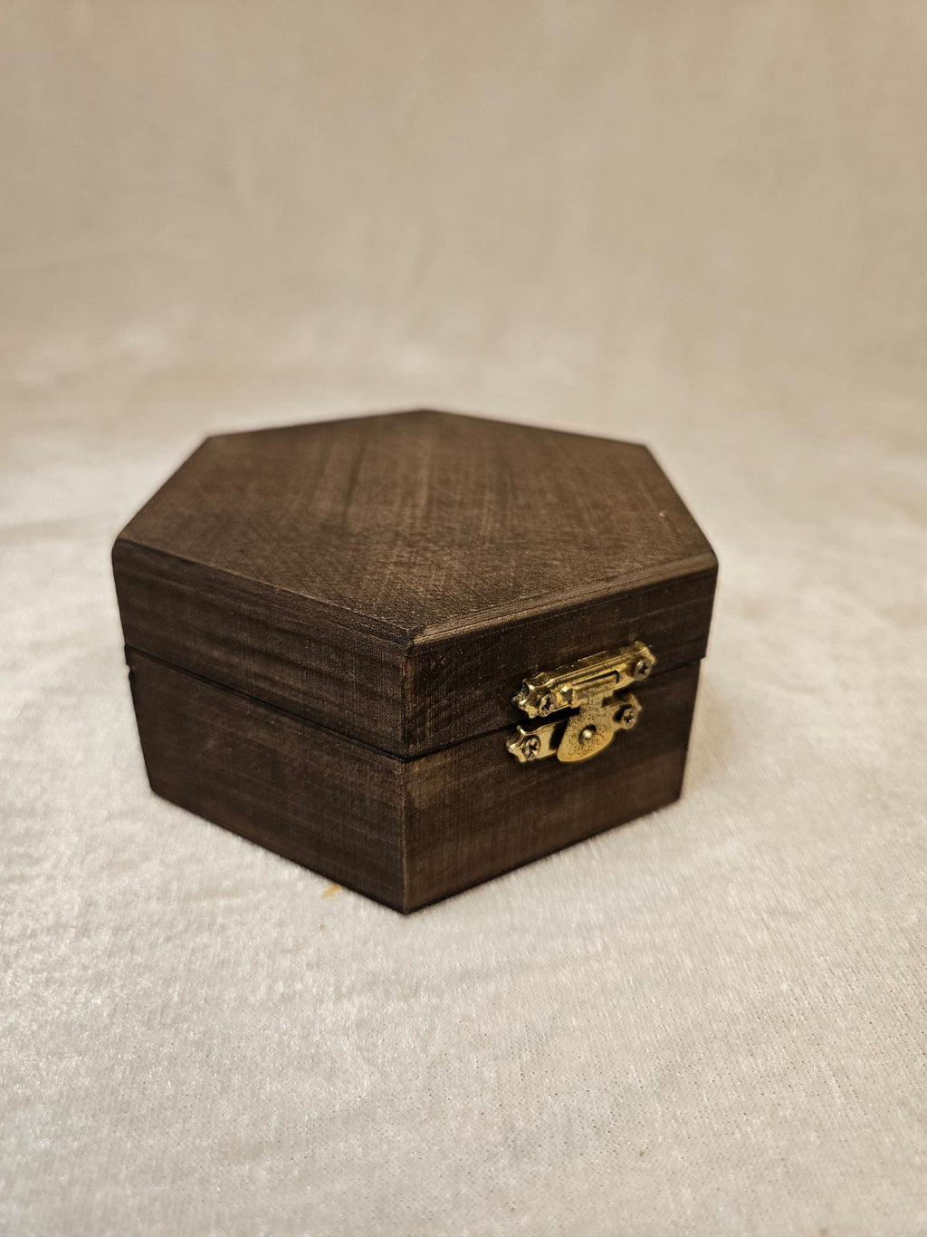 Handcrafted wooden skull box with velvet lining and brass latch