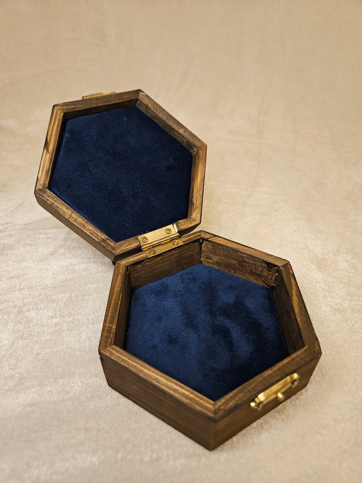 Handcrafted wooden skull box with velvet lining and brass latch